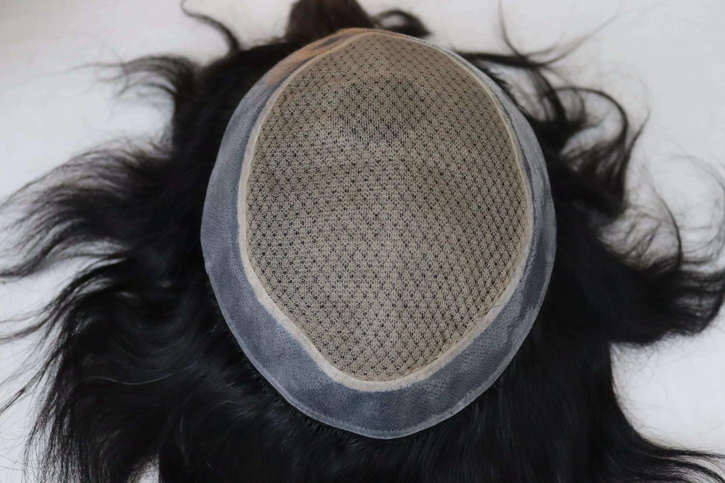 Miraz men's wig cap base showing natural hair and breathable design for comfort and durability.