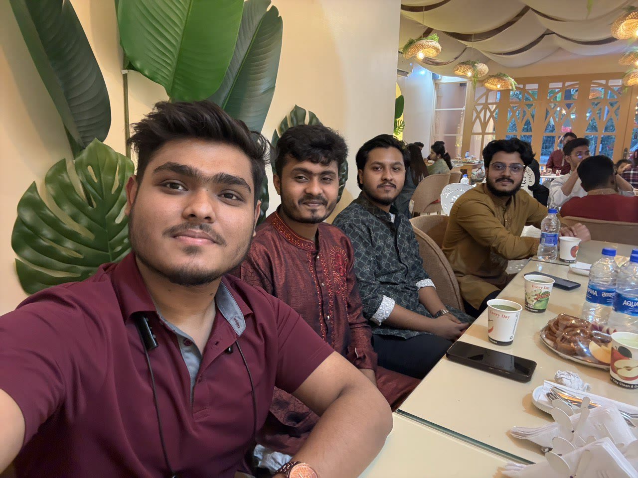 Team members enjoying an indoor gathering
