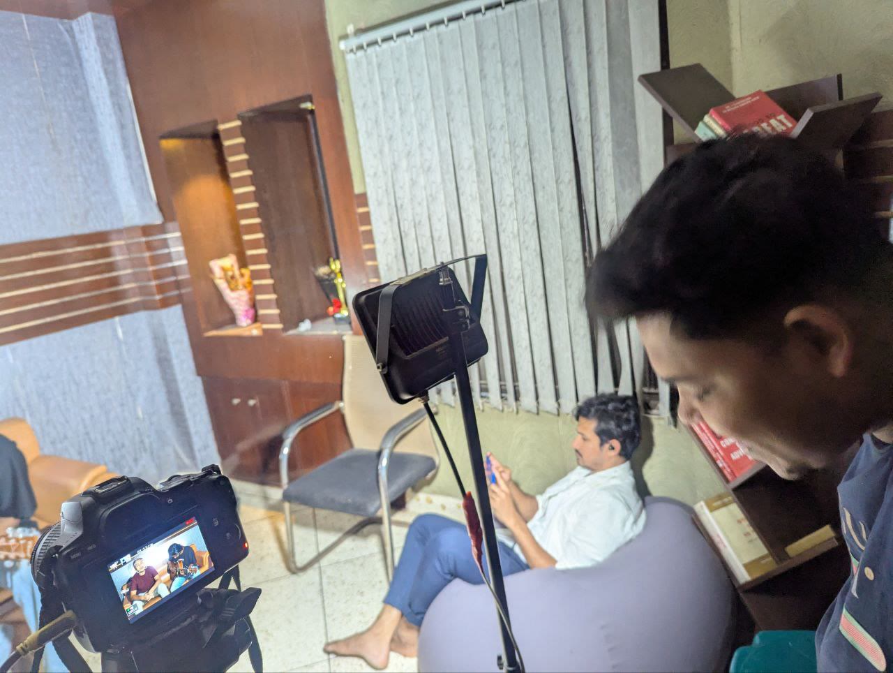 Production team monitoring a recorded performance