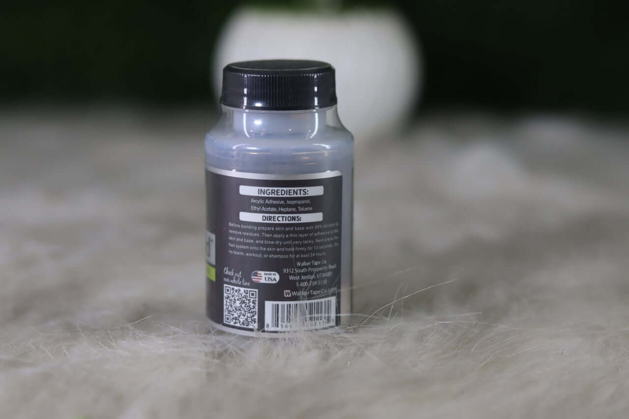 Bottle with label on a textured surface