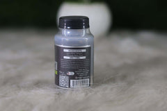 Bottle with label on a textured surface