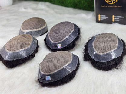 Miraz men's wig collection displayed on a soft surface, showcasing natural human hair and durable design.