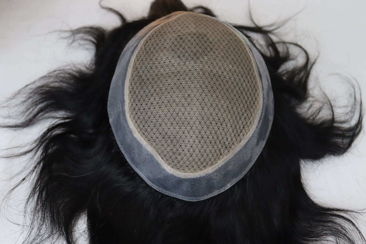 Miraz men's wig cap view showing natural hair and durable fit for a realistic look.