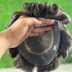 Human hair wig hair system with lace base, showing soft hair texture and breathable material for comfortable wear.
