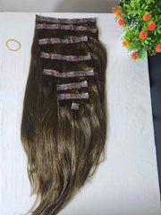 Seamless dark brown tape-in hair extensions for salon-quality look