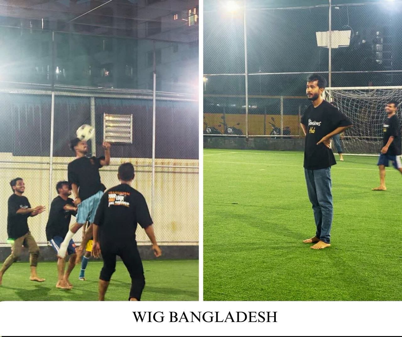 Employees playing football on an indoor pitch