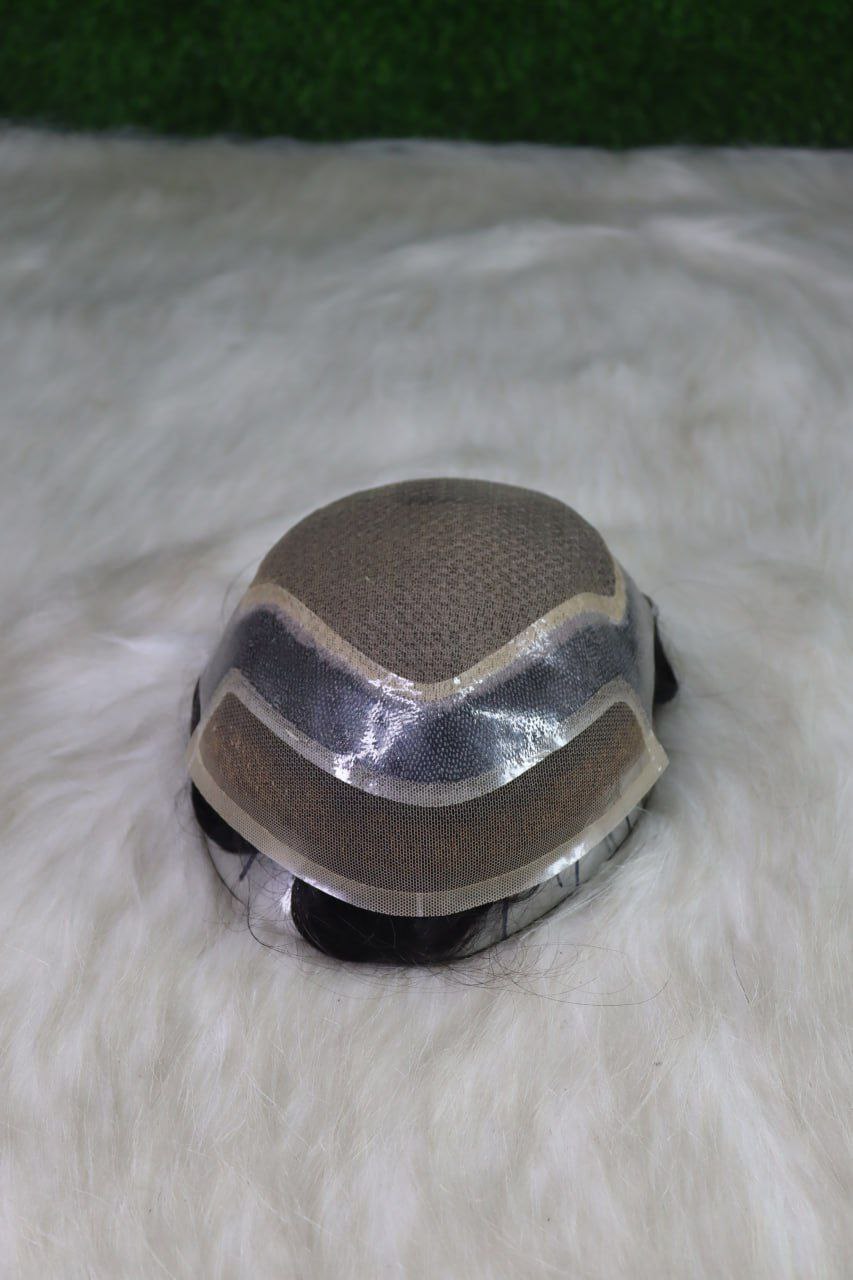 Compact men's toupee shown from the front and top