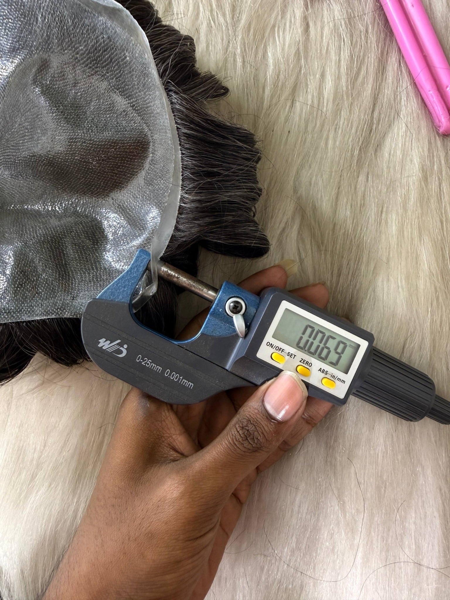 Digital measurement of a hair-system base during quality inspection